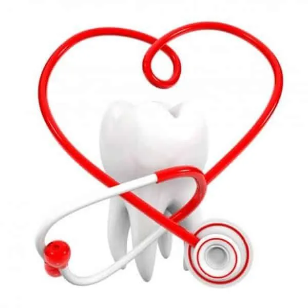 Stethoscope in a heart shape around a tooth